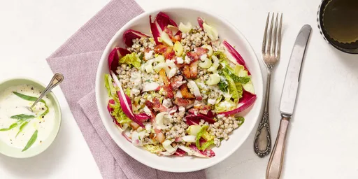 Boekweit met spekjes, wintergroenten, frisse yoghurtdressing en maanzaad