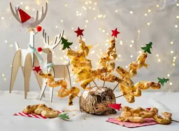 Bladerdeeghapjes in kerstboomvorm met pesto